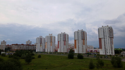 Fototapeta na wymiar City block with multi-storey residential buildings.