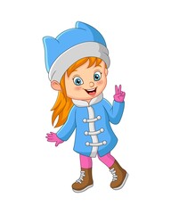 Cute little girl in winter clothes with peace hand sign