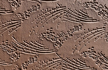 background of brown plaster with ornament