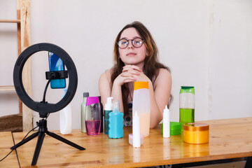  Pretty teenage blogger girl with care cosmetics