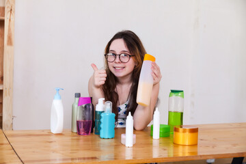  16-year-old teenage girl making   video review of cosmetics