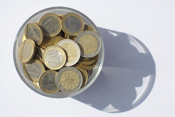Euro coins in jar