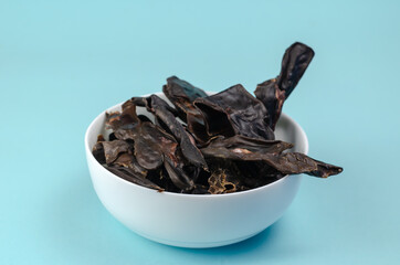 Training treats for pets on blue background. Natural Air Dried d