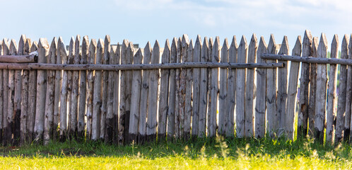 A fence made of wooden logs