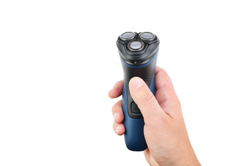 Male hand holds an electric shaver on a white isolated background. 