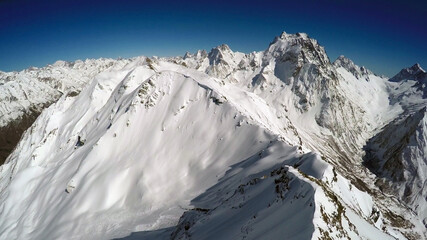Fototapeta na wymiar Caucasus, Teberda gorge. Dombai-ulgen mountain region in winter.