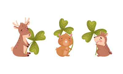 Cute baby animals with three leaf clover set. Adorable fawn, hamster, chipmunk holding shamrock leaves cartoon vector illustration