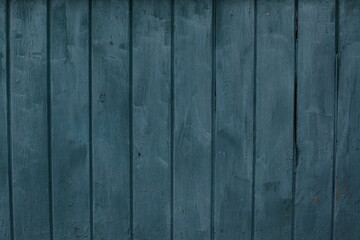Naklejka premium Shabby old wooden background in blue color. background