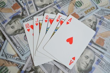 Fototapeta na wymiar playing cards and money