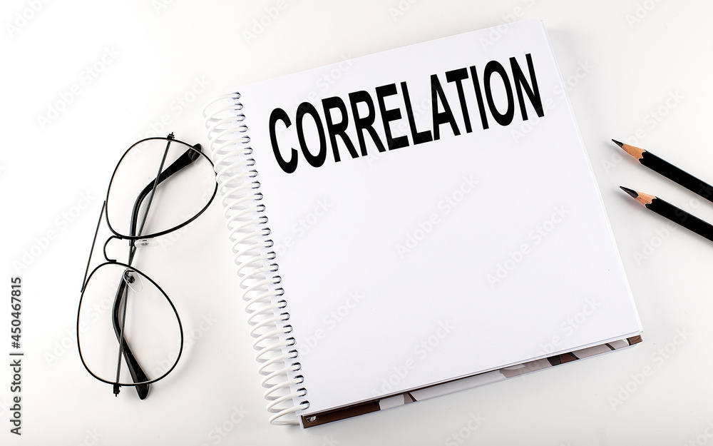 Poster notepad with text correlation . white background. business concept