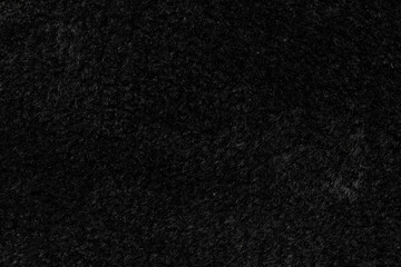 Black wool seamless texture background. dark texture with short factory wool