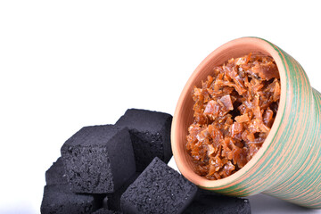Hookah bowls with tobacco and charcoal for smoking on a white background. Space for text. Banner
