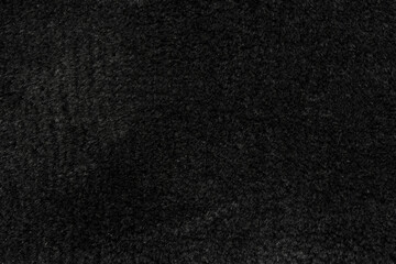 Black wool seamless texture background. dark texture with short factory wool