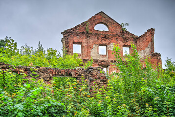 Fototapeta na wymiar Ruins of Vecmoku manor in summer day, Latvia. 