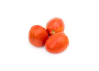 Three organic ripe tomatoes on an isolated white background