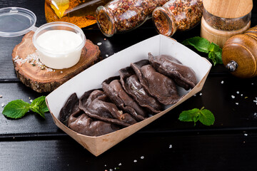 Serving chocolate dumplings with cocoa