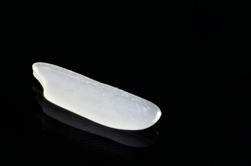 close up rice on black background