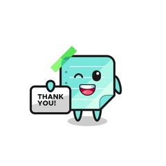 Fototapeta premium the mascot of the blue sticky notes holding a banner that says thank you