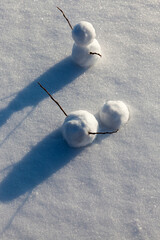 snowmen made of snow in winter