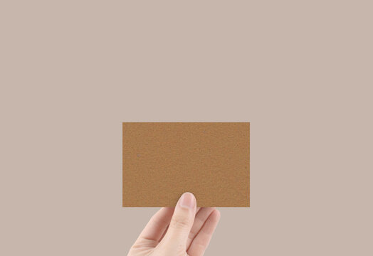 Hand Holding Business Card Mockup Craft Paper Texture Brown Print Stationery
