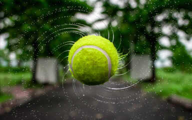 Tennis ball splashing water.