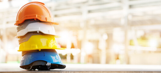 Multicolored Safety Construction Worker Hats. Teamwork of the construction team must have quality. Whether it is engineering, construction workers. Have a helmet to wear at work. For safety at work.