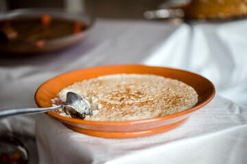 Sweet rice with cinnamon is traditional Portuguese dessert.