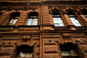 Old ornate building facade of chocolate color in Kyiv Ukraine