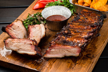 BBQ grilled ribs on a wooden board