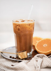 Iced Coffee and fresh orange juice beverage drink on tray