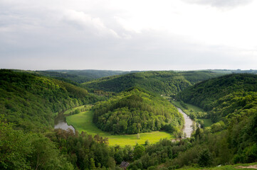 Fototapeta na wymiar River and green hills of Belgium
