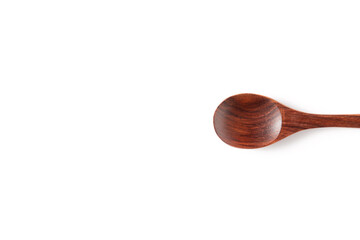 Single wooden spoon on white background.