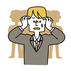 人目が気になるスーツの男性