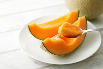 Fototapeta na wymiar 北海道産の赤肉メロン Cantaloupe melon from Hokkaido, japan