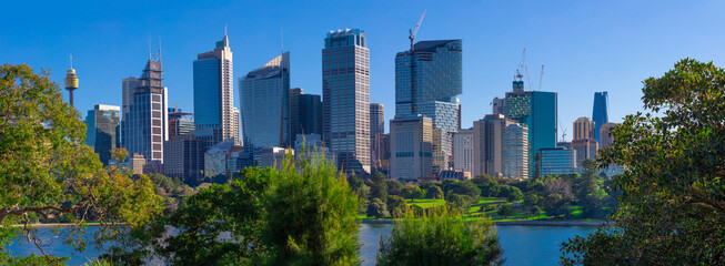Panorama view of Sydney Harbour and CBD commercial and residential buildings, hotels and officer towers on the foreshore in NSW Australia
