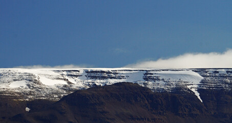 ridge from a mountain covered with ice and snow, Akureyri, Iceland