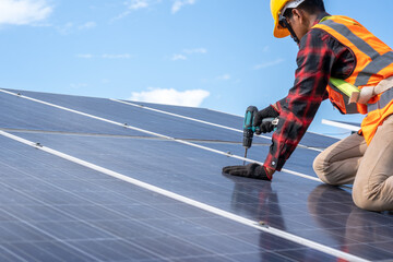 Professional worker working and installing solar panels at solar power plant,Innovative solution for energy solving,Use renewable resources,Green energy.