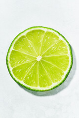 Close-up of top the slices of lime on white. macro shot. preparing cocktails, summer lemonade.