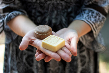 Handmade spa soap bars with natural ingredients. Organic soap making, skin care. Dried herbs, oats, rose blossoms. Spa treatments.