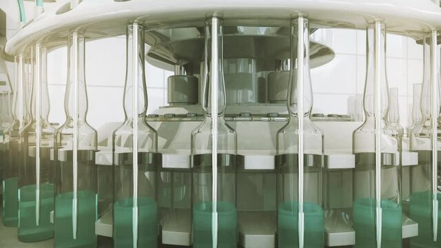 Pharmaceutical production line. Automatic factory machine for filling vials with vaccine and medicines. 3D looped video.