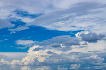 Fototapeta premium cloudy sky with dark thunderclouds approaching in the distance
