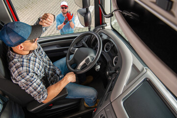 Semi Driver Talking to His Truck Dispatcher