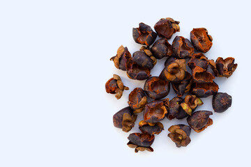 Dried mangosteen peel on white background.
