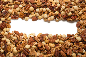 Mix of nuts isolated on white background. Top view.