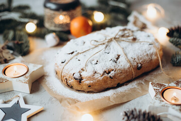Traditional german stollen cake with Christmas decorations.