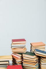 Stacks of books for teaching knowledge of the college university library white background