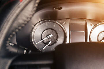 Close Up dashboard of mileage car. Passenger car speedometer with moving indicators.