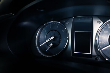 Close Up dashboard of mileage car. Passenger car speedometer with moving indicators.