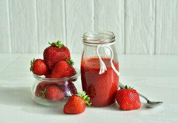 strawberry jam in a glass jar.Summer mood.