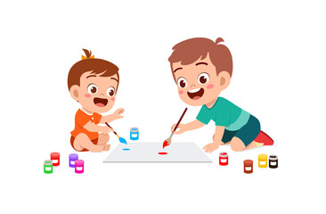 cute little boy drawing together with baby sibling